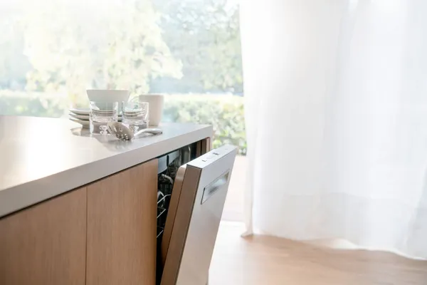 The Bosch 500 Series SHP865ZP5N dishwasher with its door open